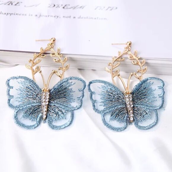 Free People Jewelry - Butterfly drop earrings M189